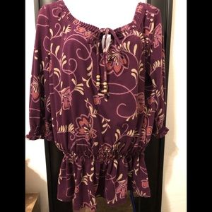 Soft top with 3/4 length sleeves.